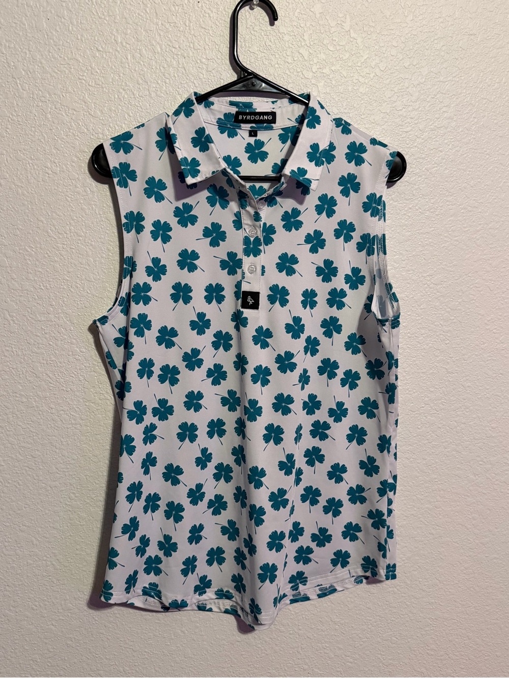 Byrdgang Women's Teal Floral Sleeveless Polo - Picture 1 of 1